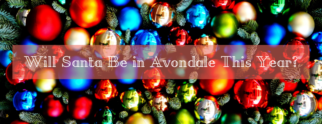 Holiday ornaments with "Will Santa Be in Avondale This Year" white text