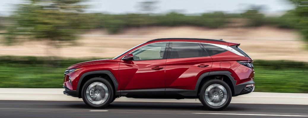 Profile view of red 2022 Hyundai Tucson