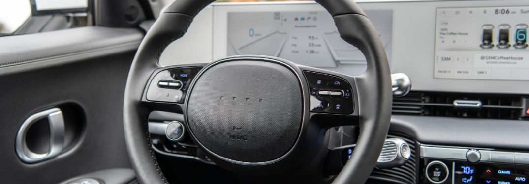 Close Up of the 2022 Hyundai IONIQ 5 Steering Wheel with Drive Mode Button