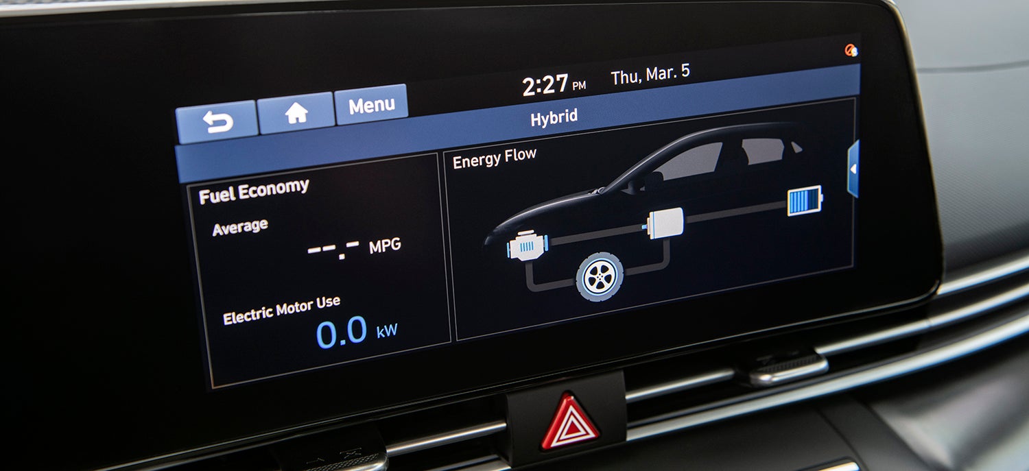 Comparison of driver cockpits in 2023 Hyundai Elantra Hybrid and 2023 Toyota Prius